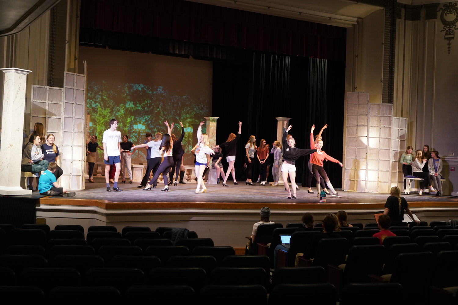 Members of the cast of Helias Catholic High School’s spring musical production of “Anastasia” rehearse a singing and dancing number on the stage of the Miller Performing Arts Center in Jefferson City on March 1.